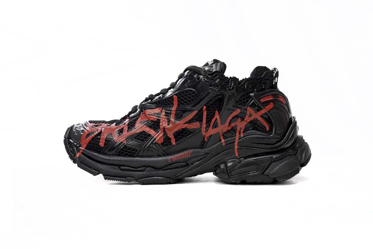 Ba*len*cia*ga men’s runner graffiti sneaker in black