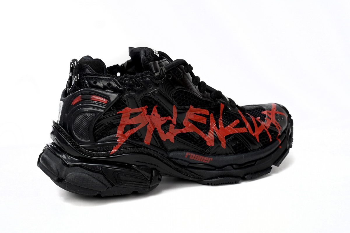 Ba*len*cia*ga men’s runner graffiti sneaker in black